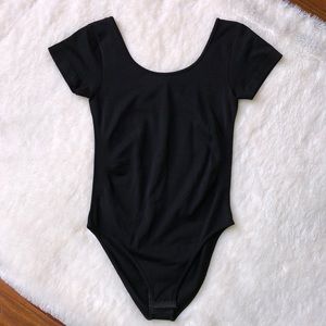 CJLA Carly Jean Bodysuit in Black. OS.